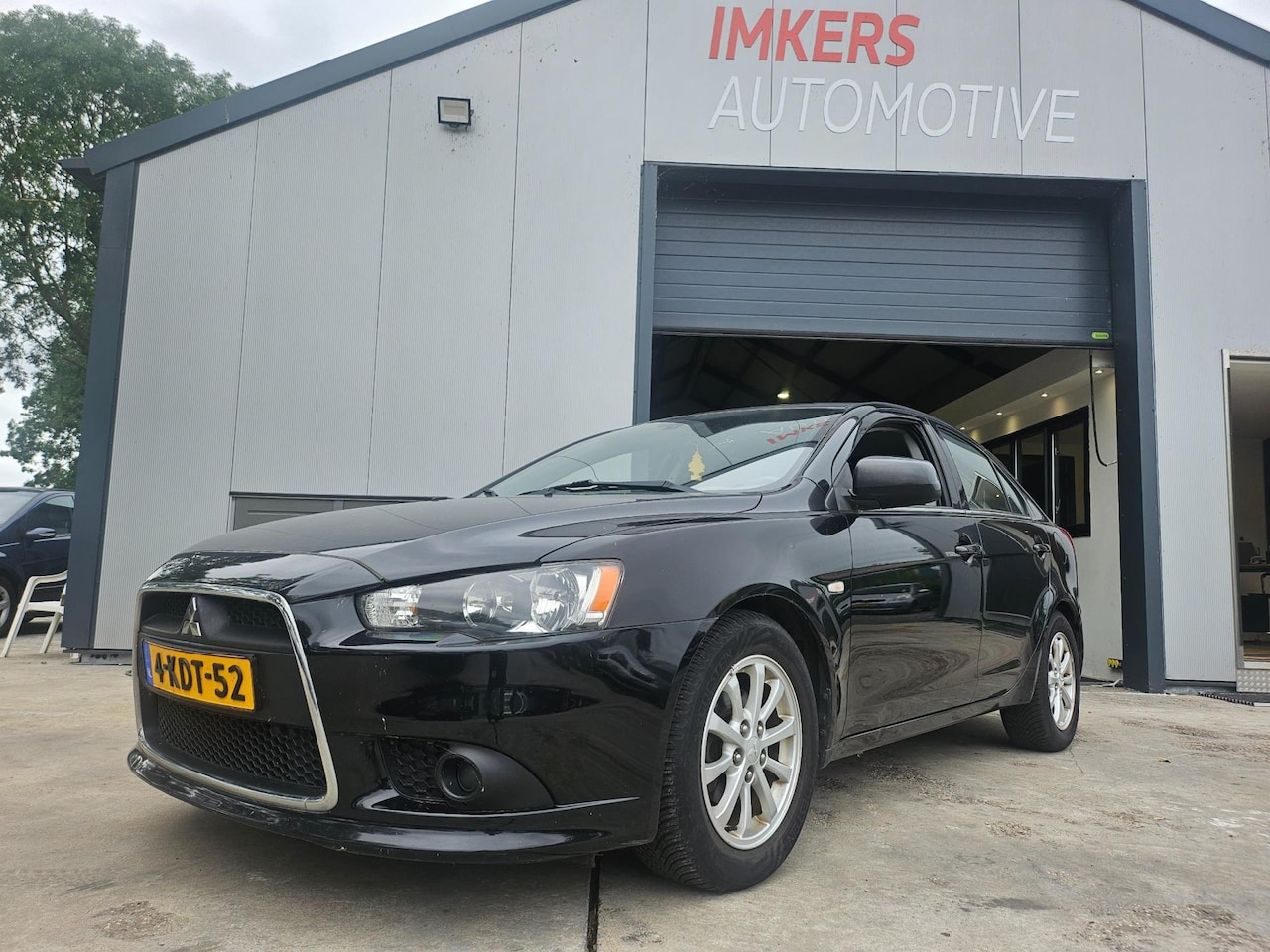 Mitsubishi Lancer Sportback - 1.6 Edition One DEALERONDERH - AutoWereld.nl