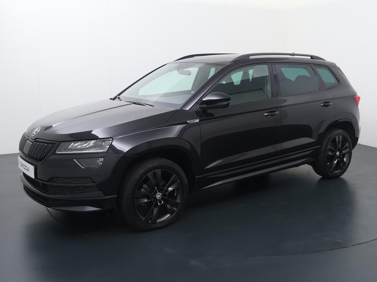 Skoda Karoq - 1.5 TSI ACT Sportline Business | 150 PK | Navigatiesysteem | Climate control | Apple Carpl - AutoWereld.nl