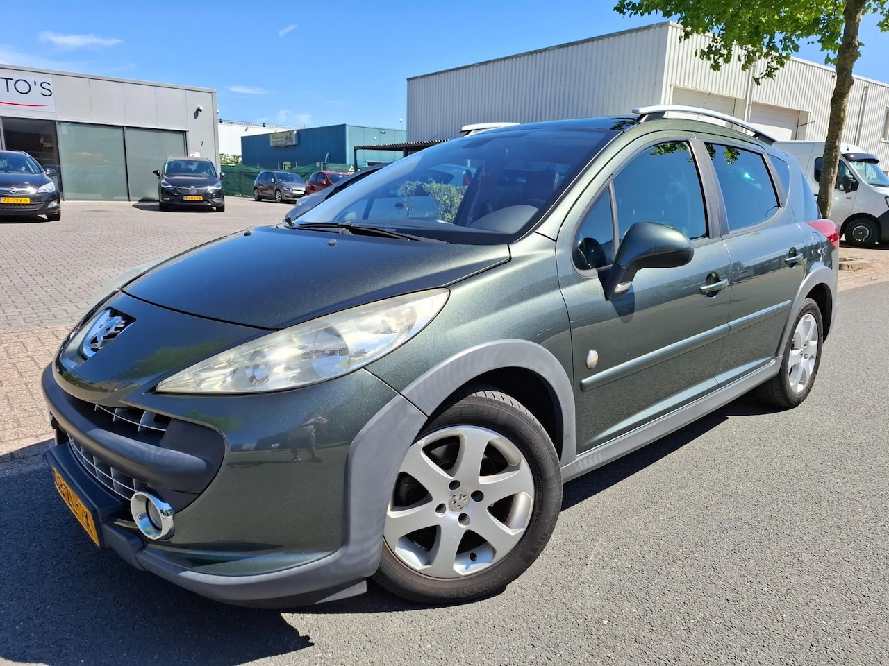 Peugeot 207 SW Outdoor - 1.6 VTi XS CLIMA/CRUISE/TREKHAAK! - AutoWereld.nl
