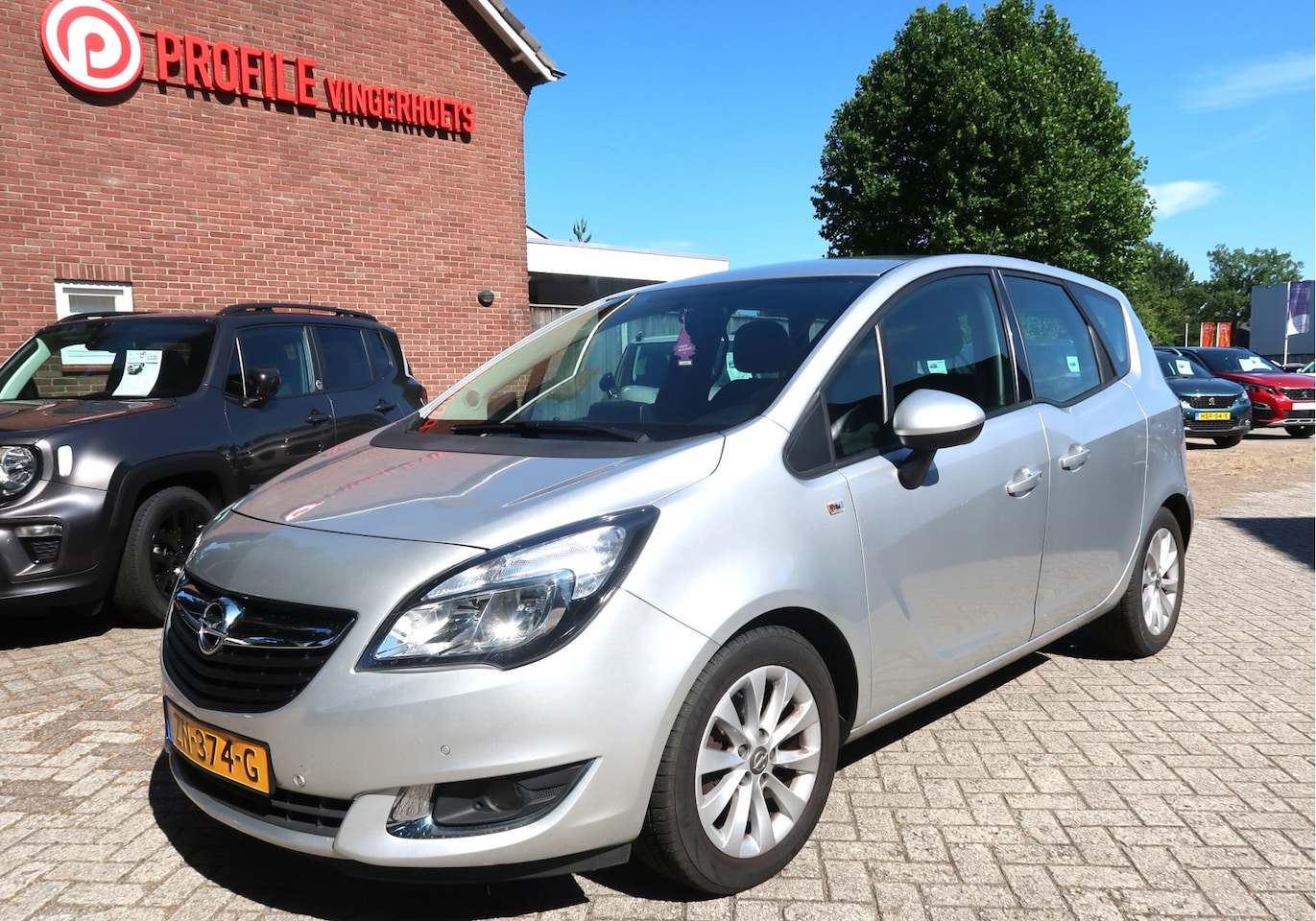Opel Meriva - 1.4 Benzine 100 Pk * Airco * Trekhaak * Bleutooth * Hoge Zit * Cruise Control * Vingerhoet - AutoWereld.nl