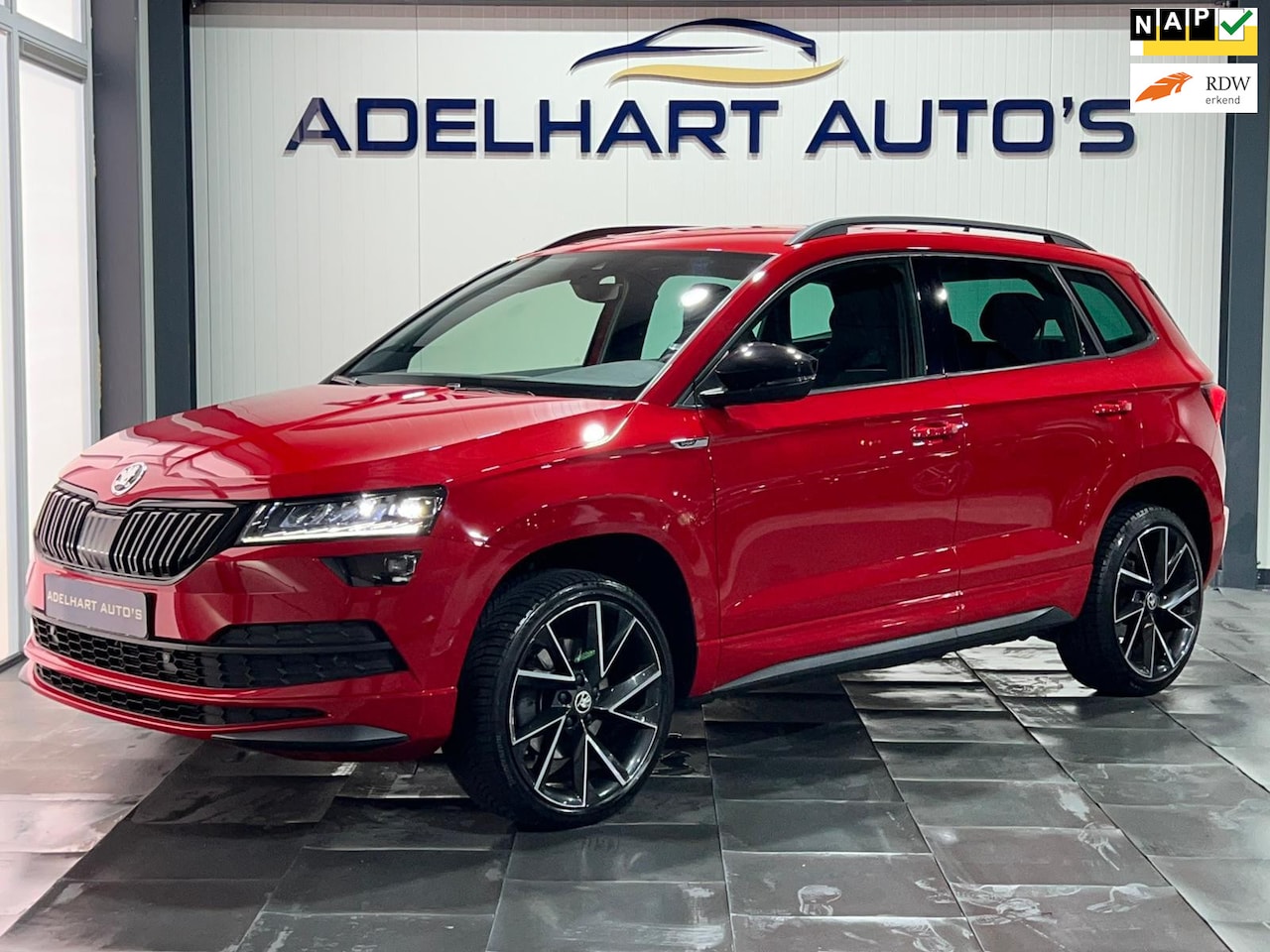 Skoda Karoq - 1.5 TSI ACT Sportline Business DSG Automaat / Navigatie full map / Camera / Cruise control - AutoWereld.nl