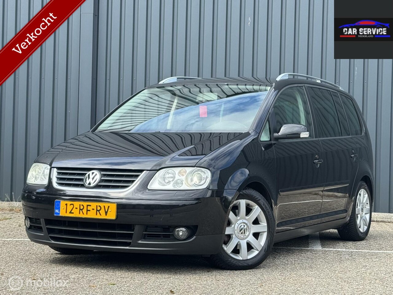 Volkswagen Touran - 2.0-16V FSI Highline/NAP/APK/AC/PDC/LMV - AutoWereld.nl