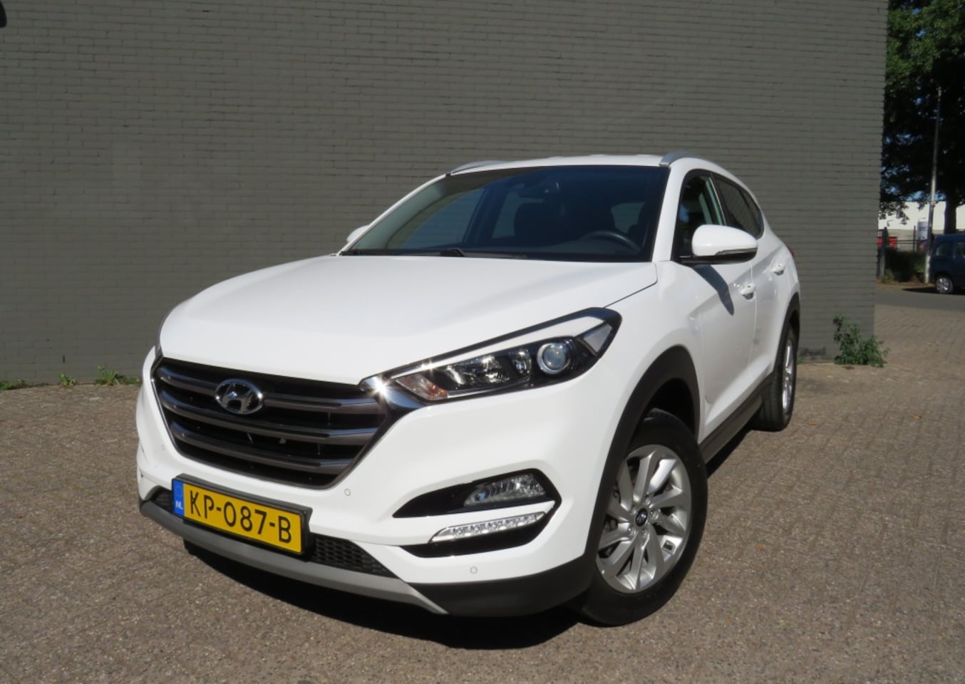 Hyundai Tucson - 1.6 GDi Comfort NAVI / CAMERA / TREKHAAK - AutoWereld.nl