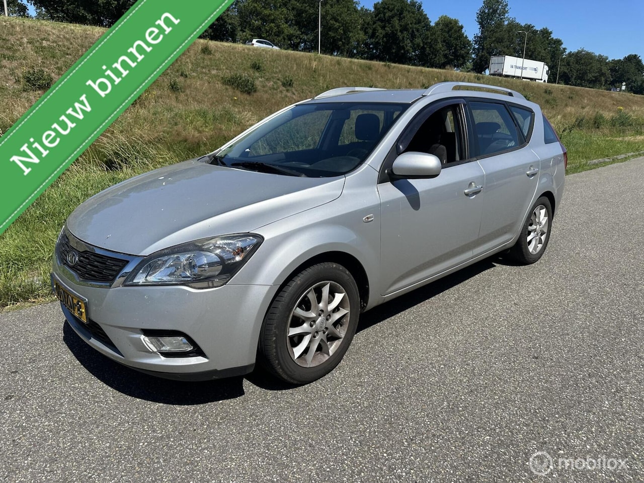 Kia Cee'd Sporty Wagon - 1.4 CVVT X-ecutive 1.4 CVVT X-ecutive - AutoWereld.nl