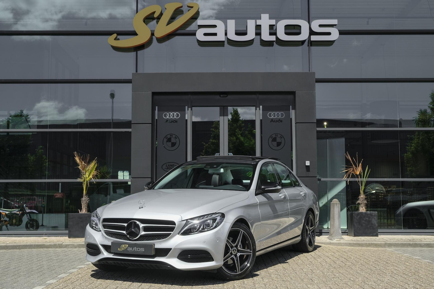 Mercedes-Benz C-klasse - C180 156pk Ambition Panoramadak 1/2 Leder Navigatie Stoelverwarming Led intelligent NLauto - AutoWereld.nl