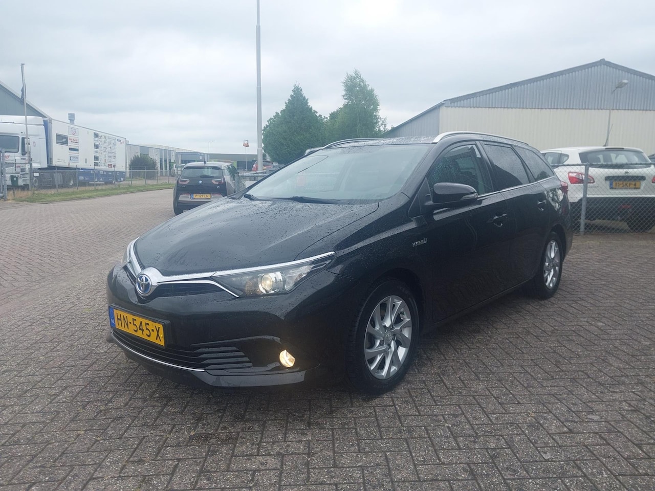 Toyota Auris - 1.8 Hybrid Lease Pro !! PANORAMA !!! - AutoWereld.nl