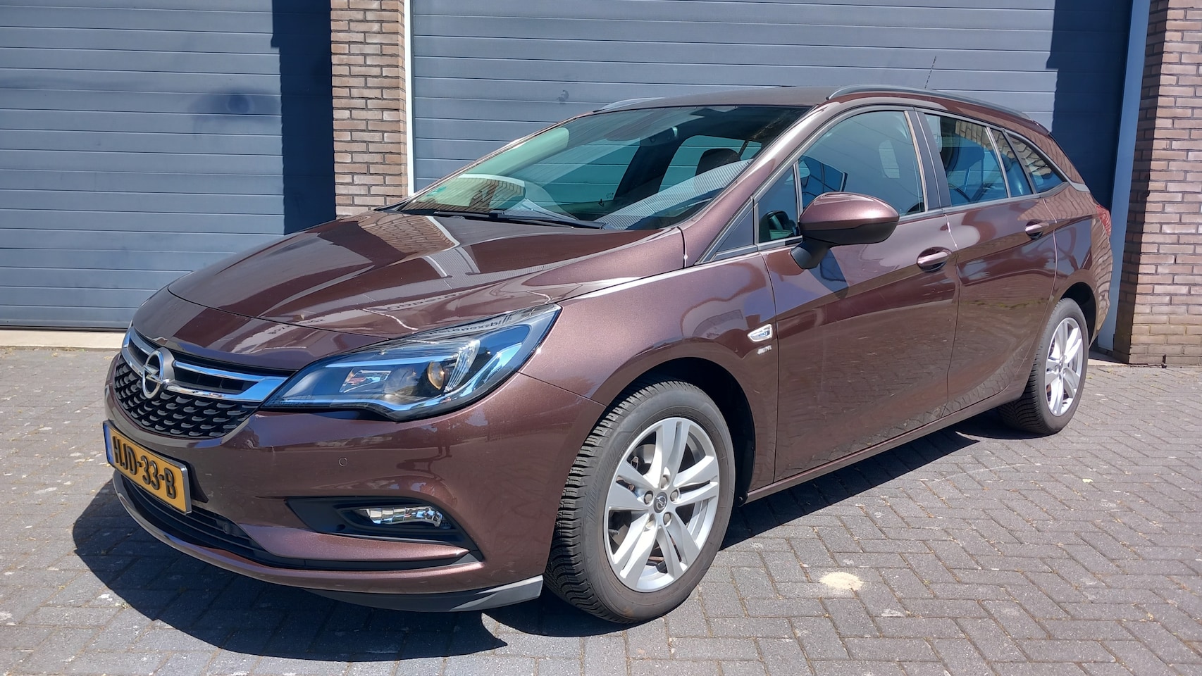 Opel Astra Sports Tourer - 1.0 Online Edition Winterpakket PDC - AutoWereld.nl