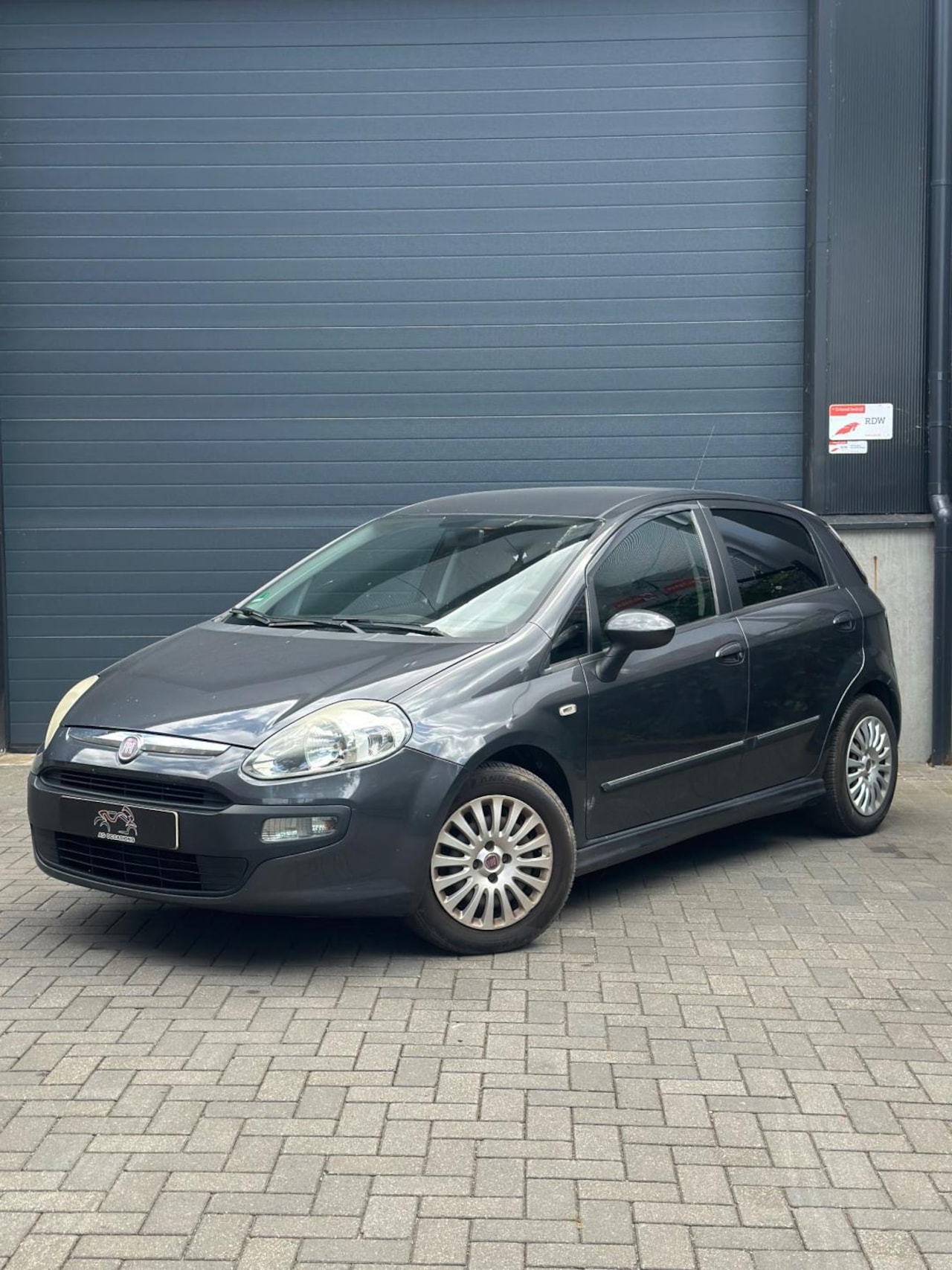 Fiat Punto Evo - 1.3 M-Jet Dynamic Airco - Cruise - E5 - AutoWereld.nl