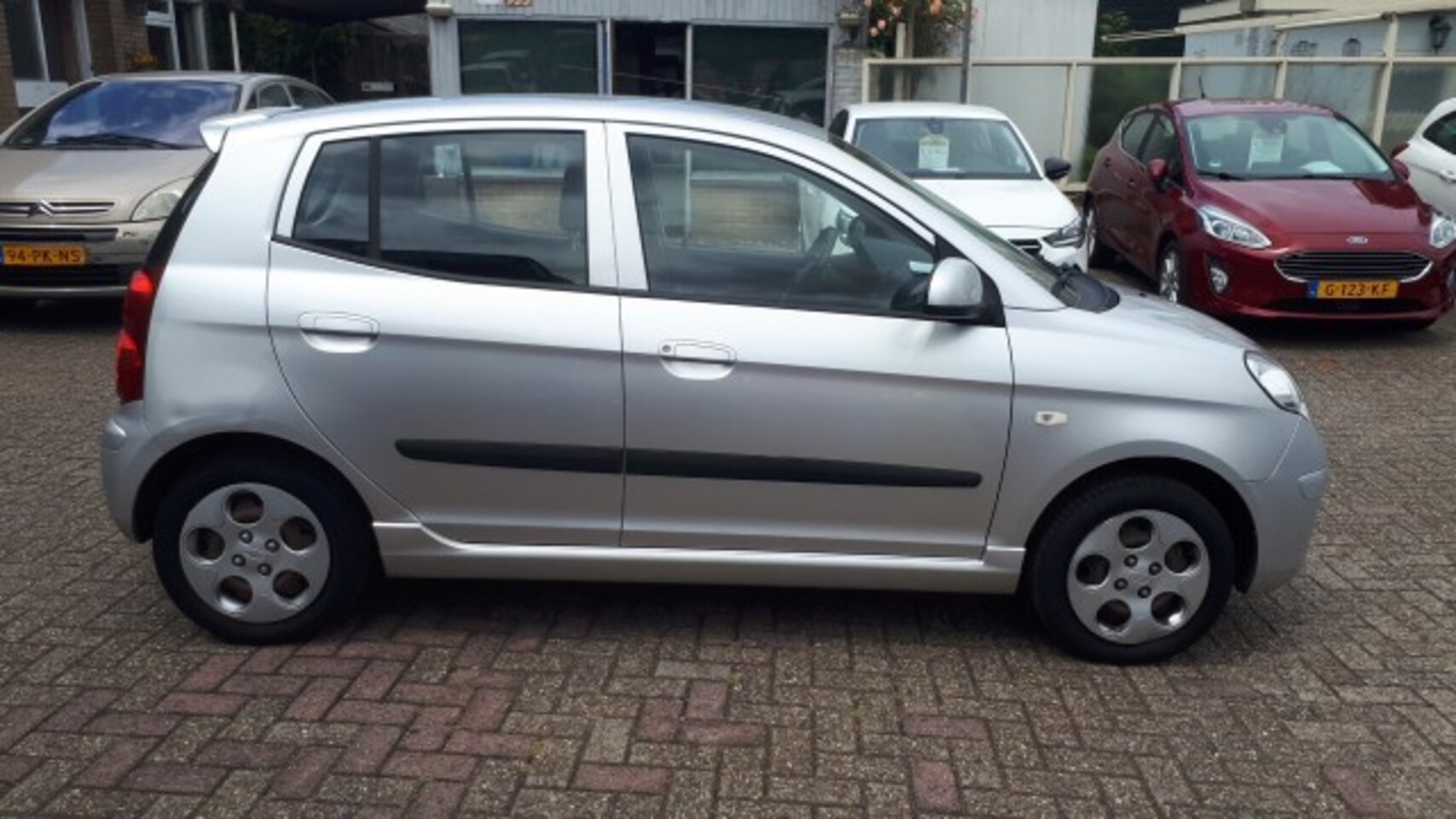 Kia Picanto - 1.0 Seven RADIO CD/AIRCO/ELEC RAMEN/CV/TREKHAAK/1E EIG.
