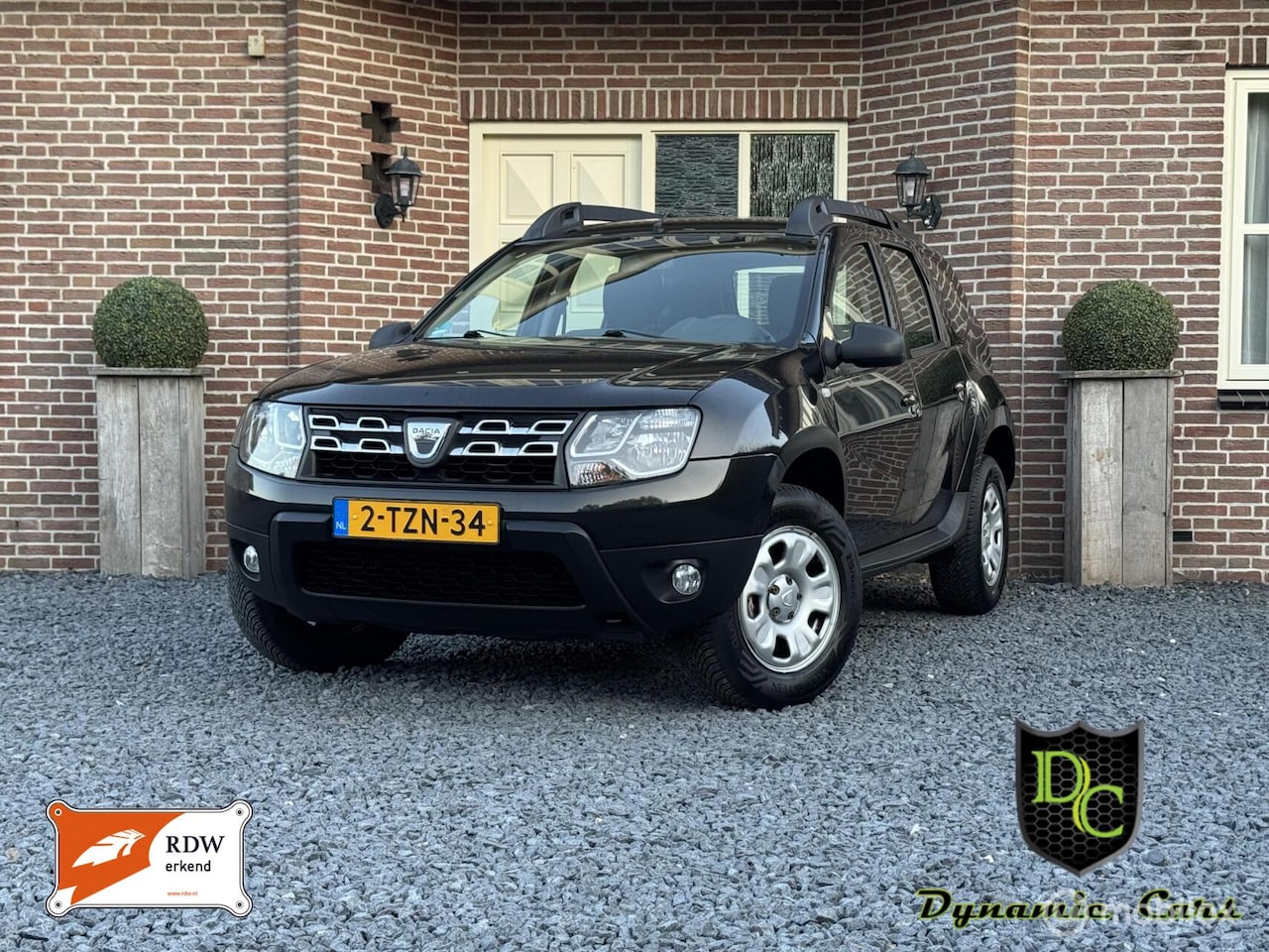 Dacia Duster - 1.2 TCe 4x2 Lauréate *Airco *Trekhaak *NAP *APK - AutoWereld.nl