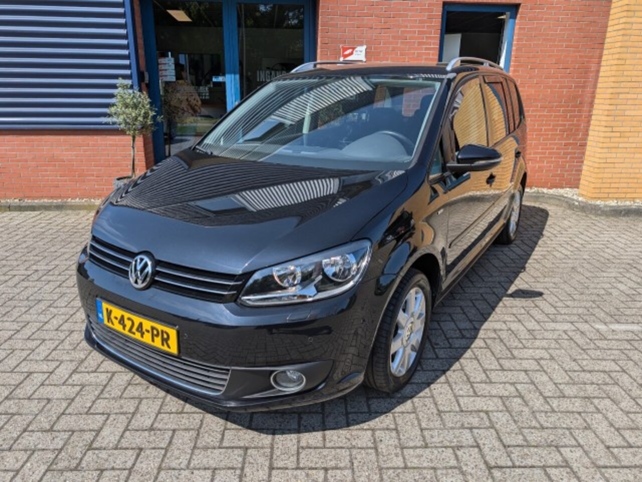 Volkswagen Touran - 1.4 TSI Comfortline 1.4 TSI Comfortline, AUTOMAAT, PDC, Stoeverwarming, Navi - AutoWereld.nl