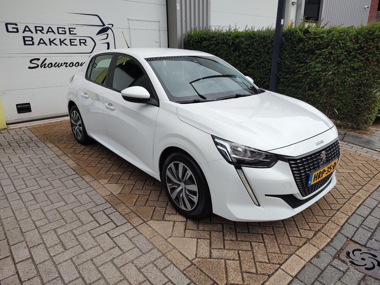 Peugeot 208 - 1.2 PureTech Blue Lease Allure Keyless Navi-Carplay Led Cruise-Control Airco - AutoWereld.nl
