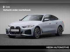 BMW i4 - eDrive40 84 kWh | M Sportpakket | Extra getint glas in achterportierruiten en achterruit |