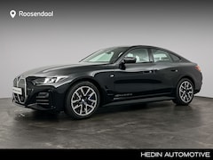 BMW i4 - eDrive40 M Sport Edition 84 kWh | Schuifdak | Driving Assistant | Trekhaak | Comfort Pack