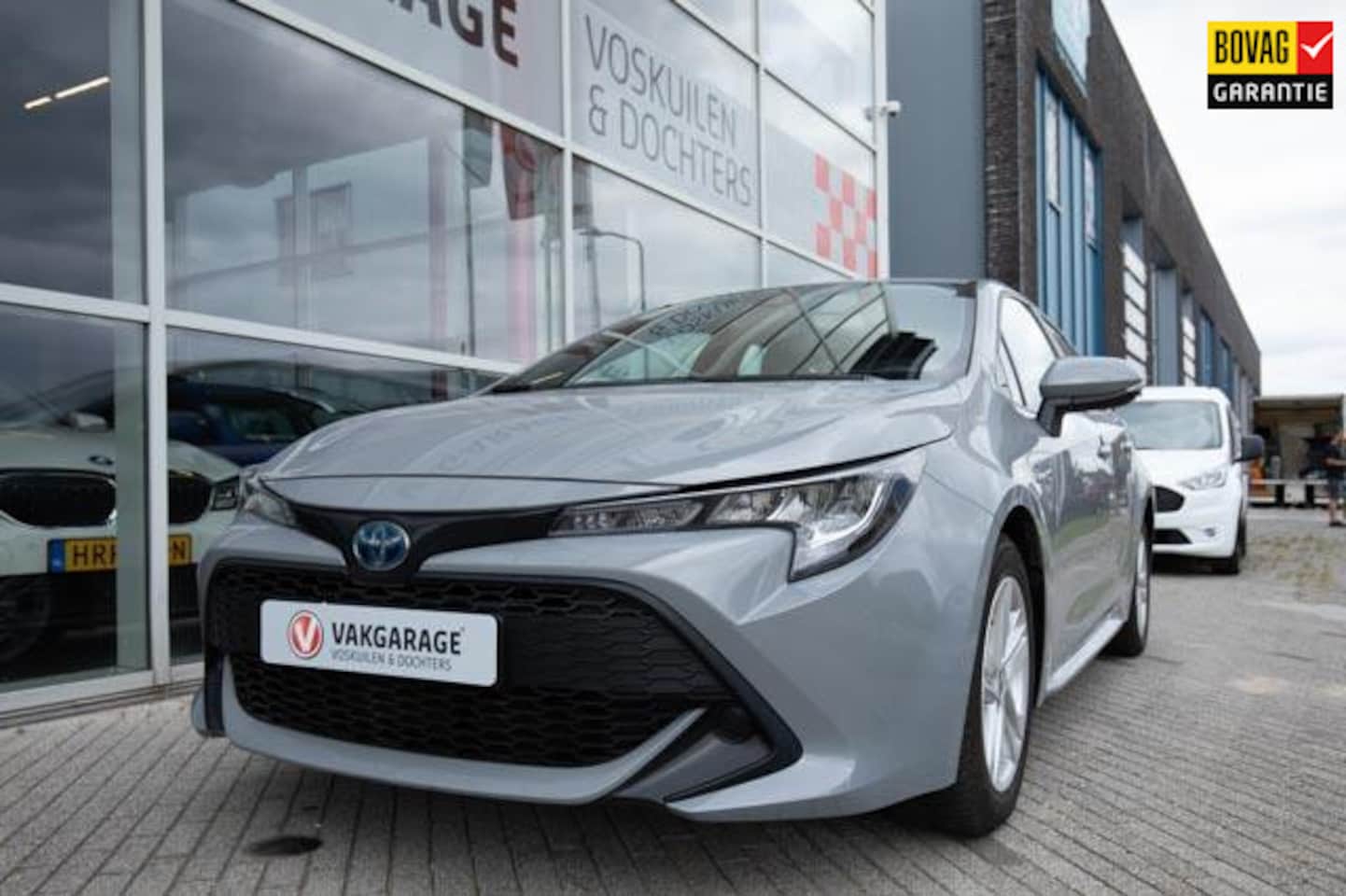Toyota Corolla Touring Sports - 1.8 Hybrid Active Carplay | Camera - AutoWereld.nl