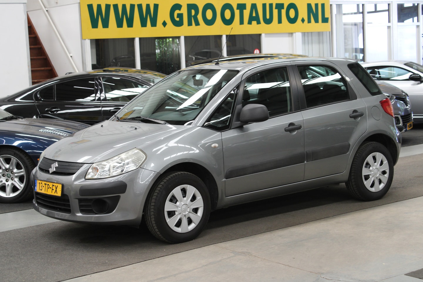Suzuki SX4 - 1.5 Base 79.825km NAP, Airco, Trekhaak, Stuurbekrachtiging - AutoWereld.nl