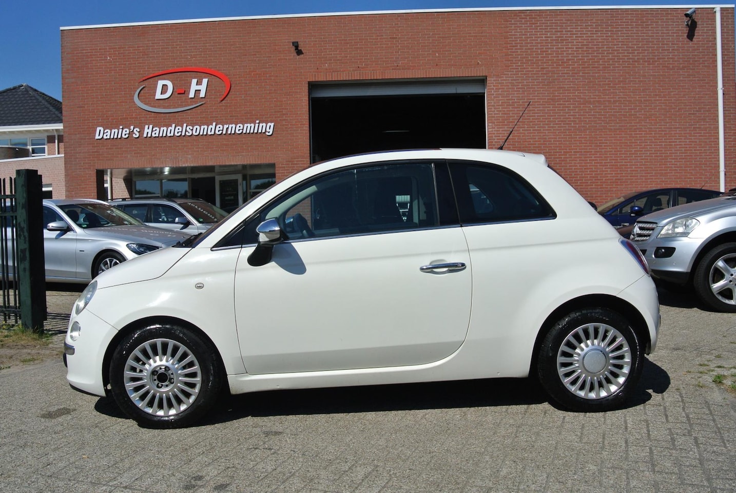 Fiat 500 - 0.9 TwinAir Lounge airco panoramadak inruil mogelijk nap - AutoWereld.nl