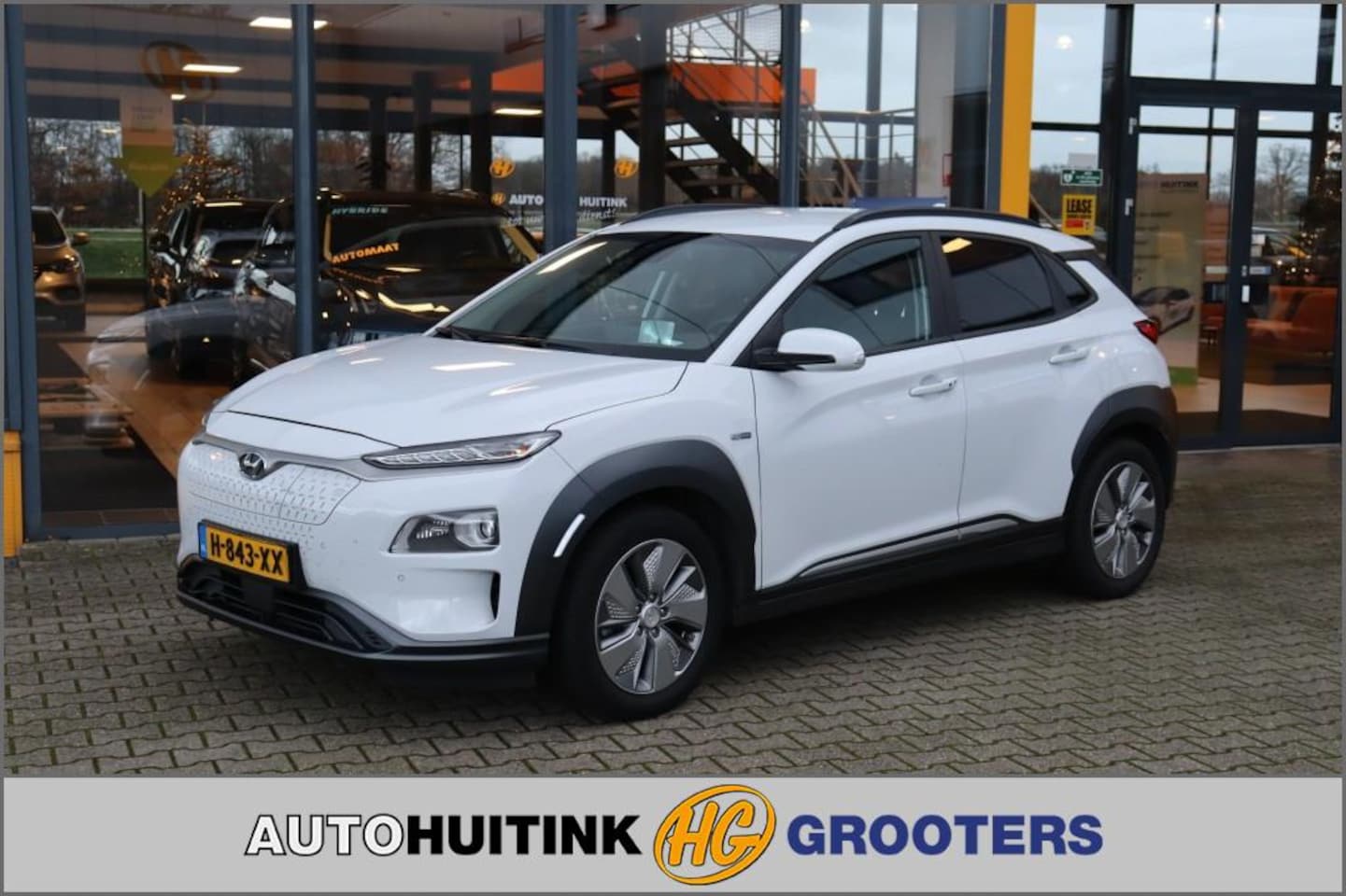 Hyundai Kona - EV Premium 64 kWh - Navi - Camera - Headup - AutoWereld.nl