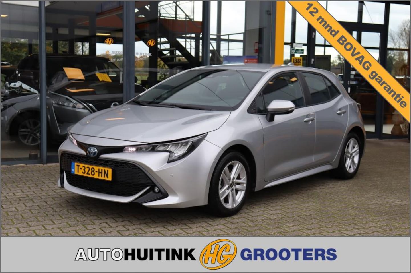 Toyota Corolla - 1.8 Hybride Active - Navi - Camera - AutoWereld.nl