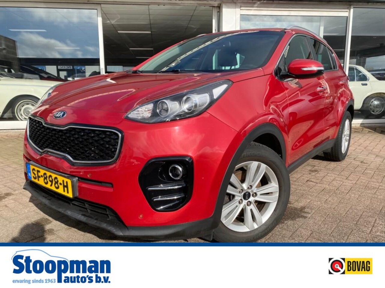 Kia Sportage - 1.6 Design Edition Clima Cruise Leder Navi Bluetooth - AutoWereld.nl