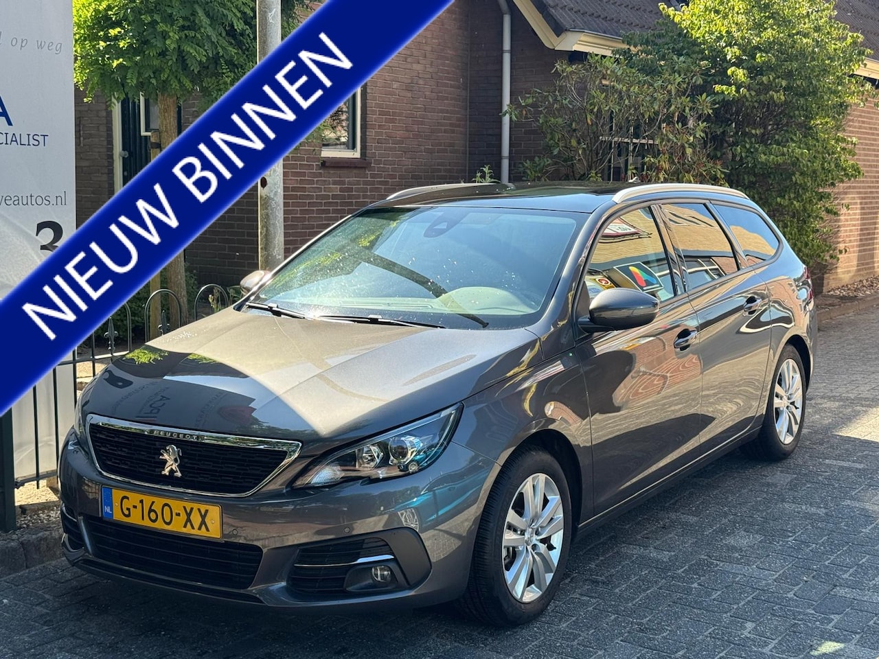 Peugeot 308 SW - 1.2 PureTech Blue Lease Executive 1.2 PureTech Blue Lease Executive - AutoWereld.nl