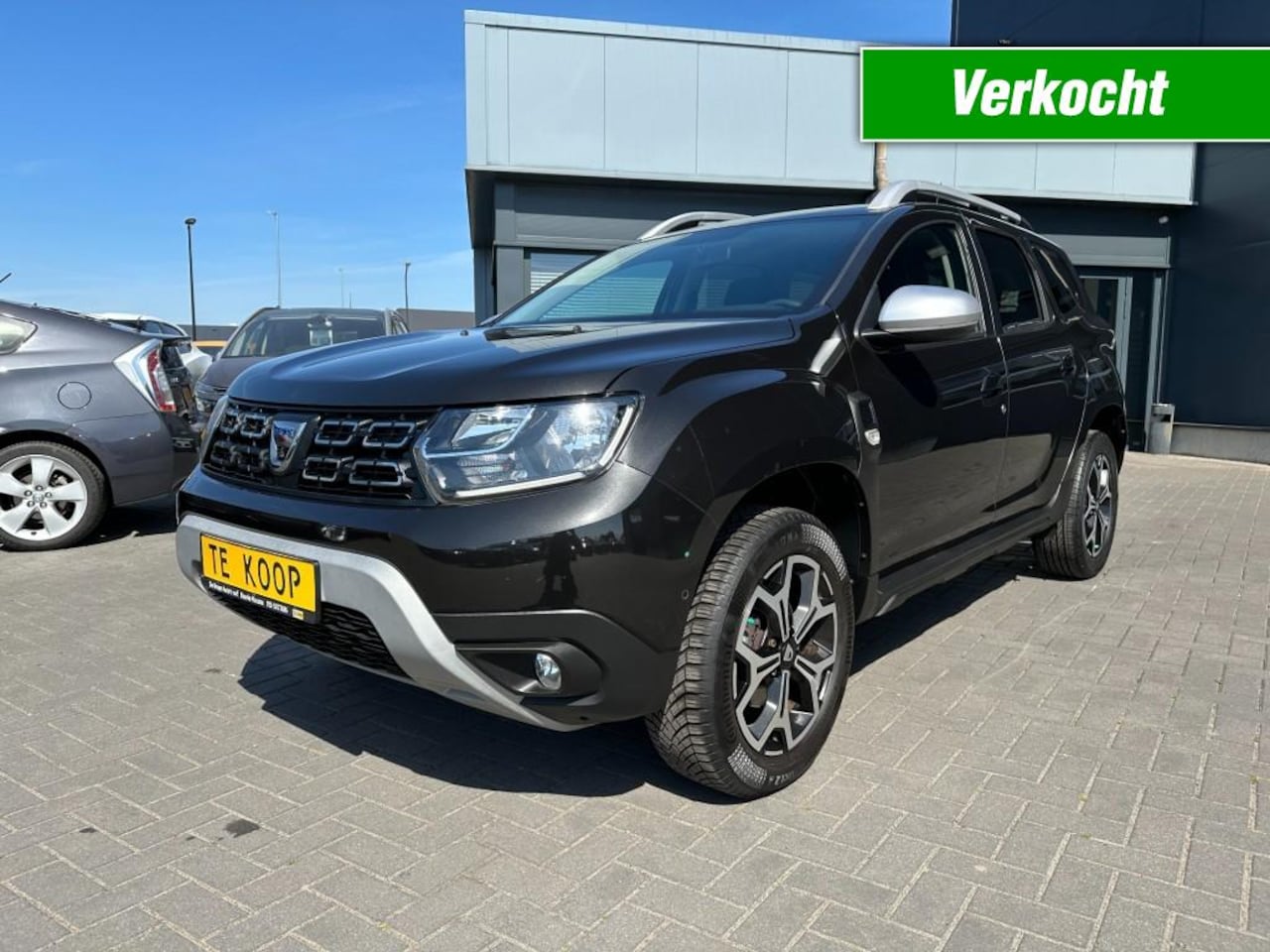Dacia Duster - 1.3TCe Prestige Zwart, 1e eigenaar! Navigatie, airco - AutoWereld.nl
