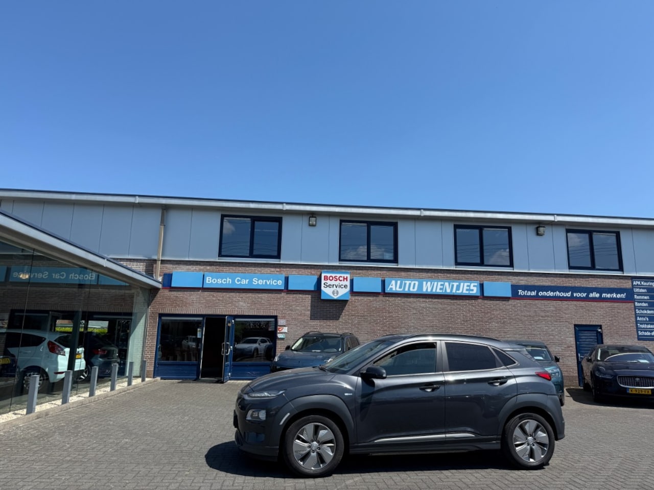 Hyundai Kona Electric - EV Premium Sky | 64kWh | Leer | Navi | Schuifdak - AutoWereld.nl