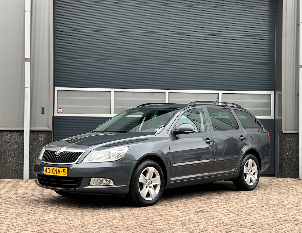 Skoda Octavia Combi - 1.2 TSI Ambition Business Line bj.2012 Navi|Clima|Trekhaak|Nap - AutoWereld.nl