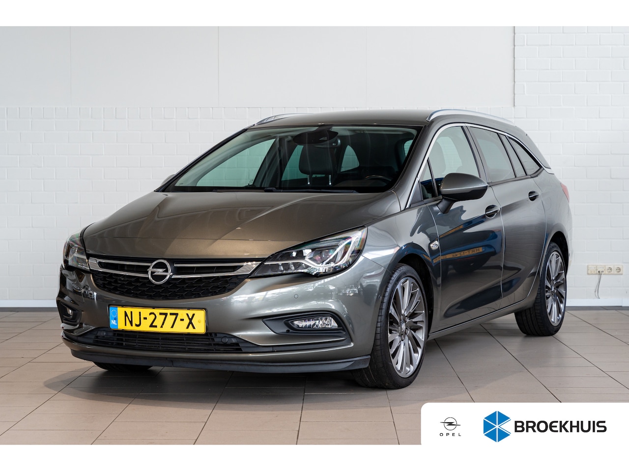 Opel Astra Sports Tourer - 1.4 Turbo 150PK Automaat Innovation | Leder | AGR | Navigatie | Stoel & Stuurverwarming | - AutoWereld.nl