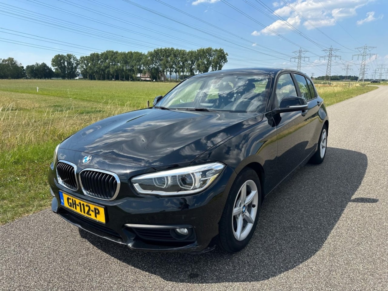 BMW 1-serie - 116d EDE Essential EURO 6 | 2E EIGENAAR ! - AutoWereld.nl