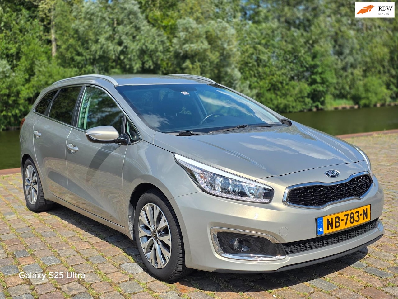 Kia Cee'd Sportswagon - 1.6 GDI DynamicLine Achteruit camera cruis control navigatie parkeer sensor trekhaak parke - AutoWereld.nl