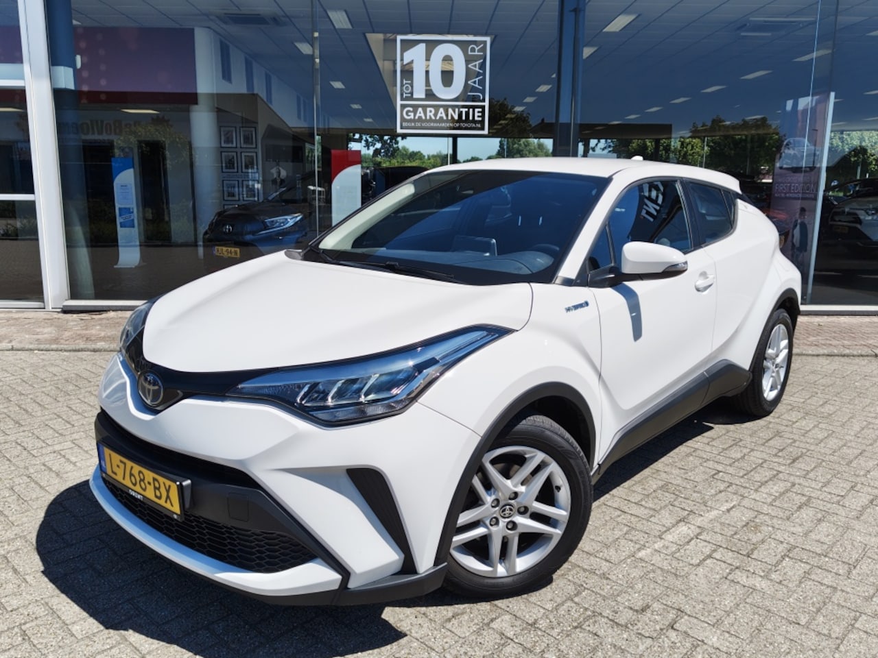 Toyota C-HR - 1.8 Hybrid Active | Trekhaak | Org. NL! | Andoroid Auto, Apple C - AutoWereld.nl