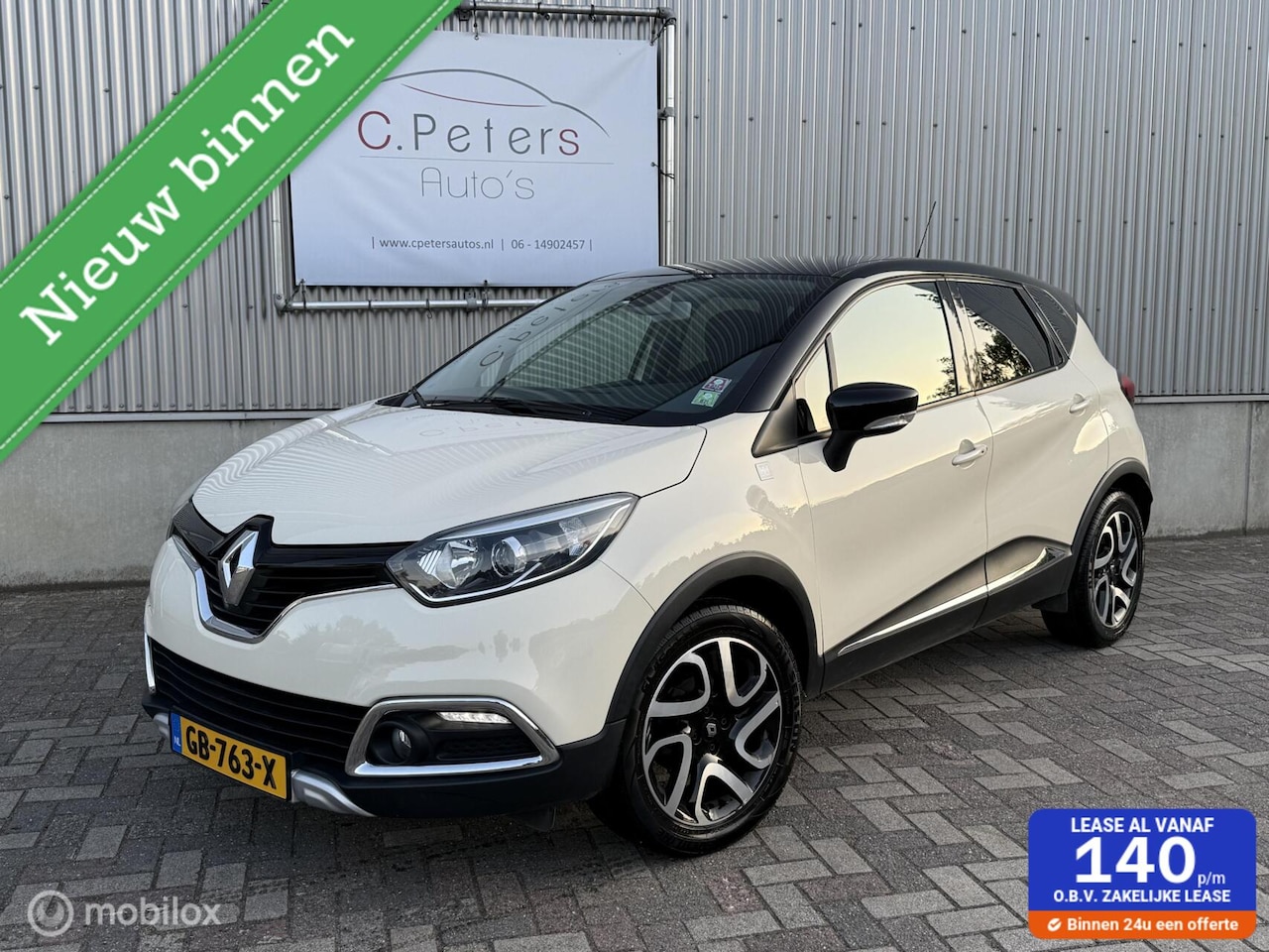 Renault Captur - 0.9 TCe Helly Hansen 2015 / Trekhaak / Camera / Keyless / R-Link Navigatie / Climate contr - AutoWereld.nl