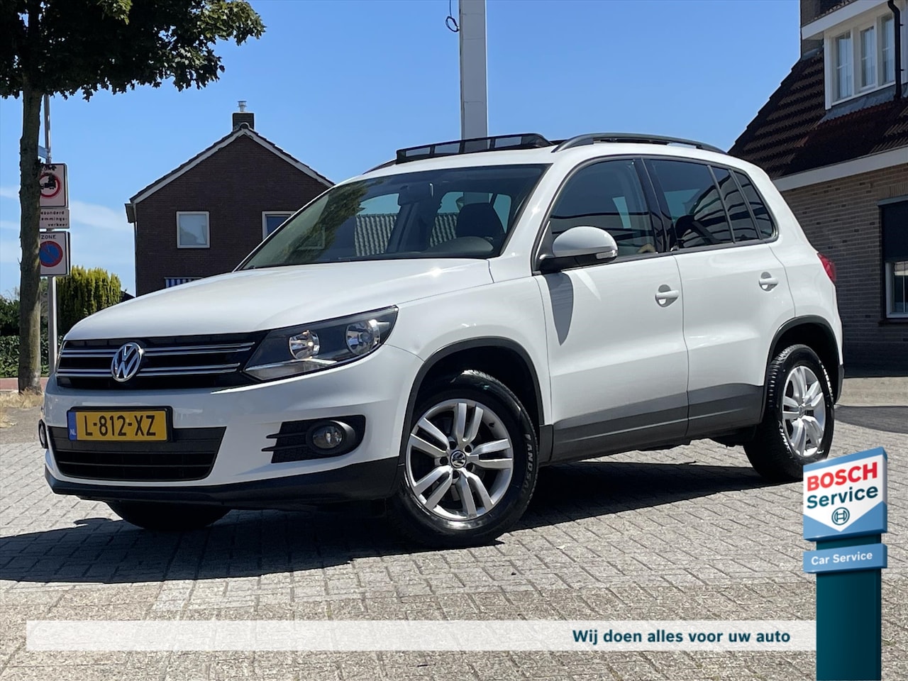 Volkswagen Tiguan - 1.4 TSI Sport&Style / Pano / Trekhaak / Clima / Lichtmetaal - AutoWereld.nl
