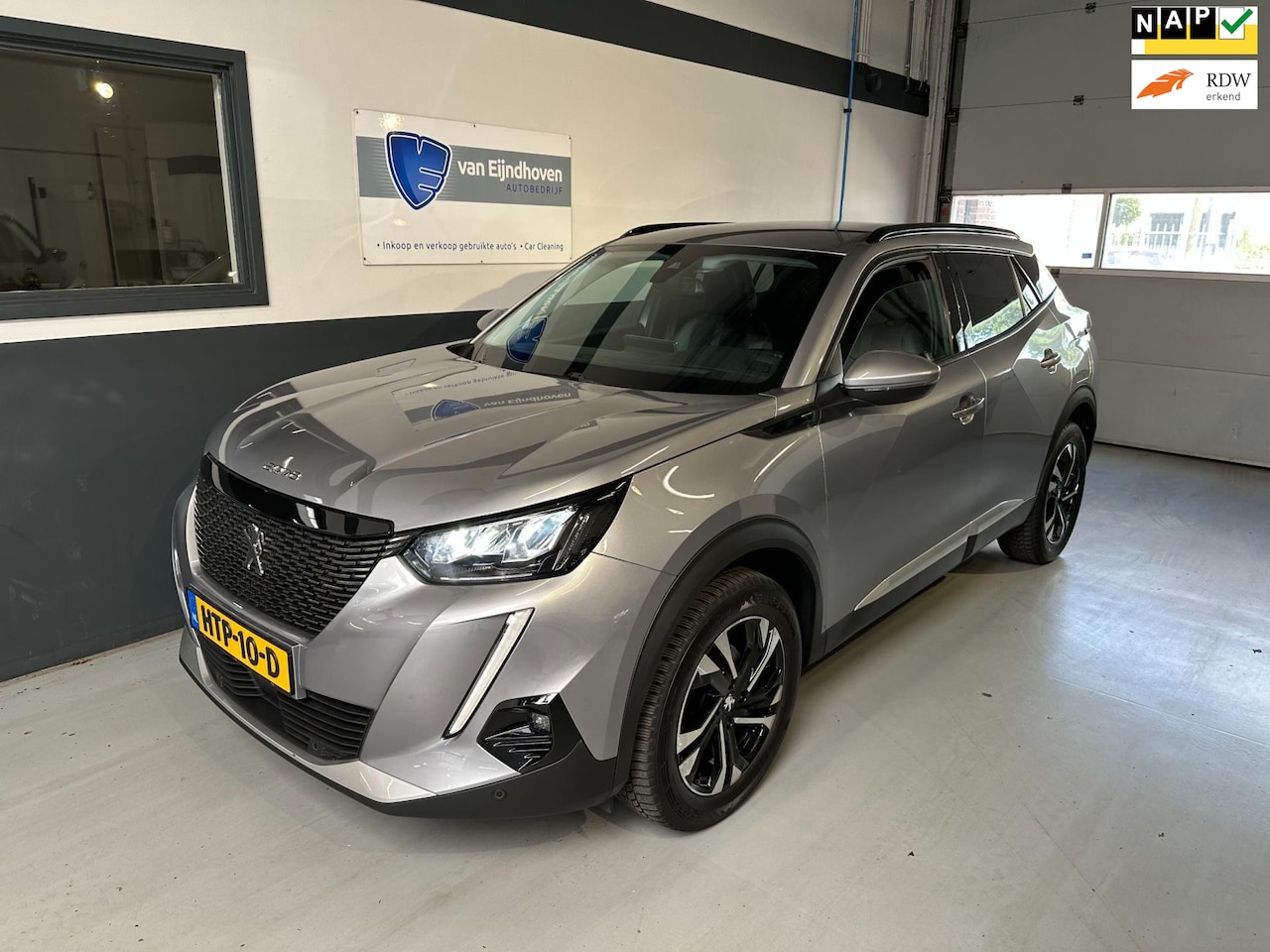 Peugeot 2008 - 1.2 PureTech Blue Lease Active Navi|Carplay|Cam - AutoWereld.nl