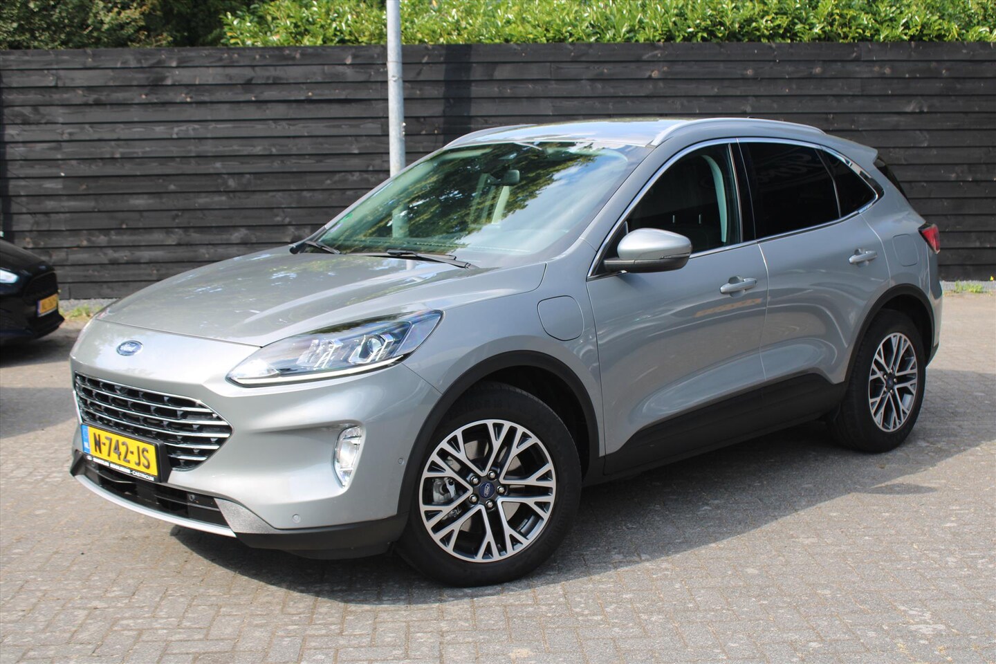 Ford Kuga - 2.5 PHEV AUT 225pk Titanium, Winterpack, Trekhaak, Adaptive Cruise, 18" velgen - AutoWereld.nl