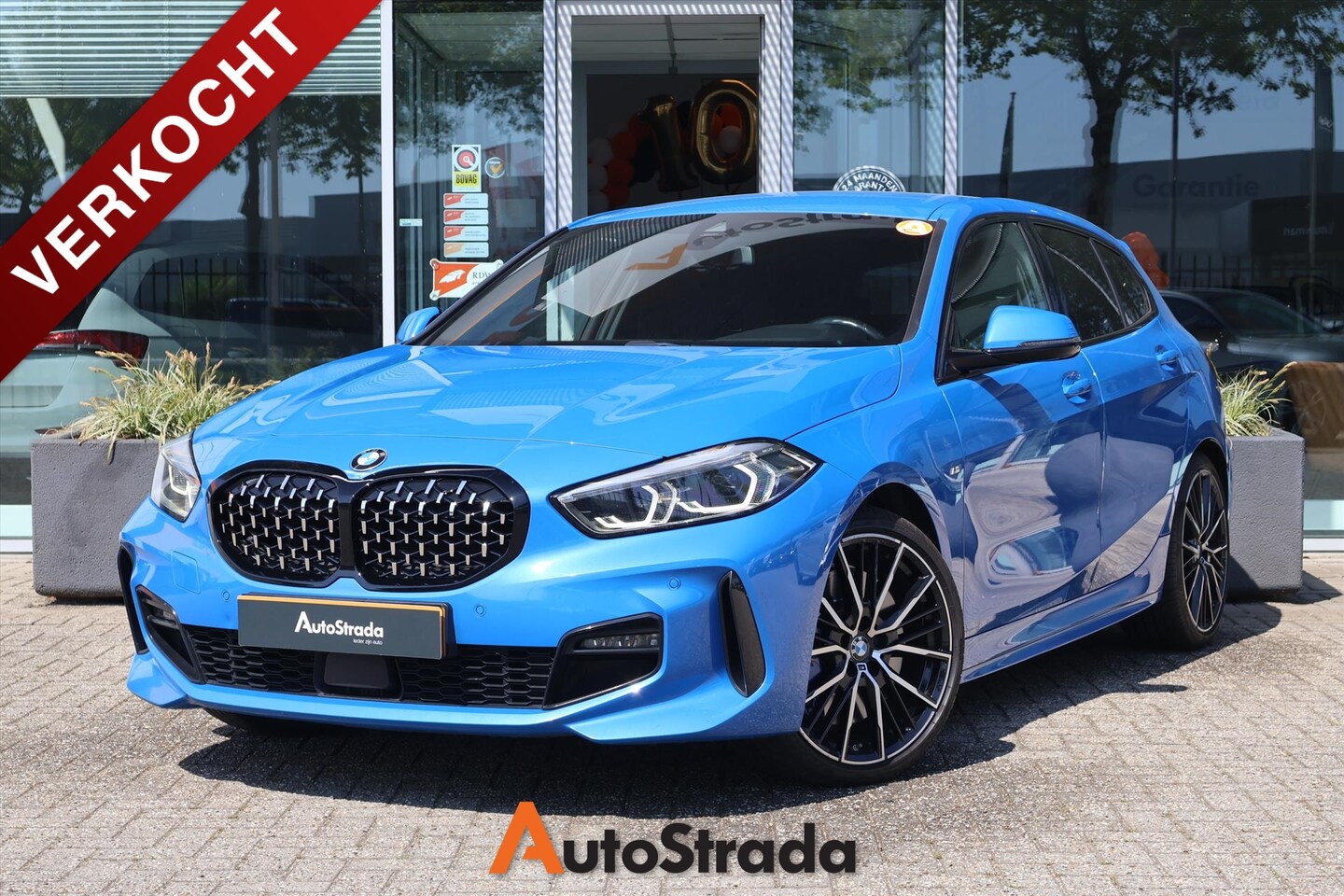 BMW 1-serie - (f40) 118i M-Sport 140PK AUT | Carplay I Misano Blue I Navi I Camera I Kuipstoel - AutoWereld.nl