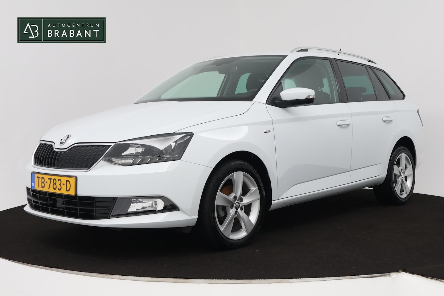 Skoda Fabia Combi - 1.0 TSI Clever Edition (PARKEERSENSOREN, STOELVERWARMING, NAVIGATIE, NL-AUTO) - AutoWereld.nl
