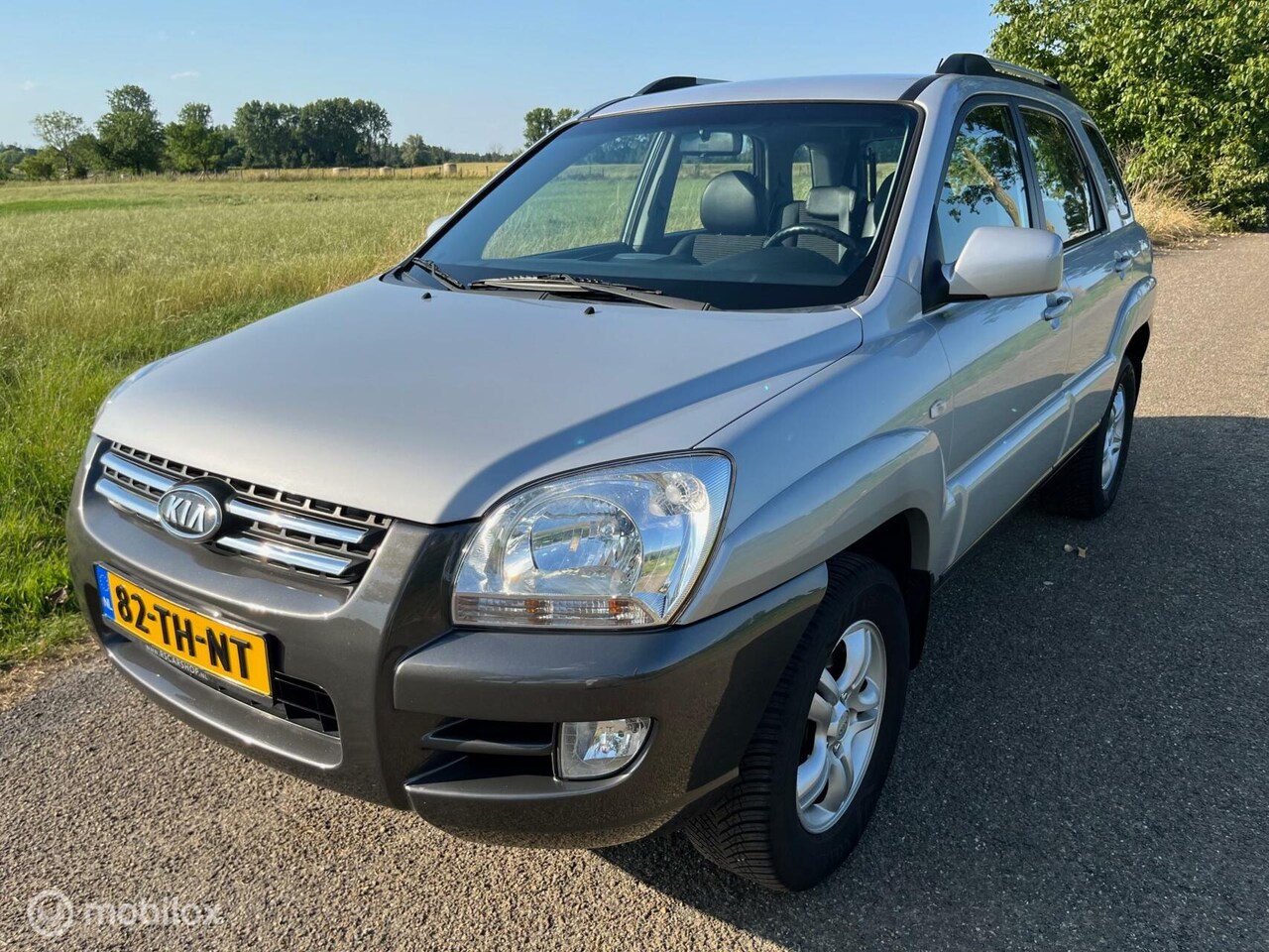 Kia Sportage - 2.0 CVVT Executive Climate/Cruise/Trekhaak - AutoWereld.nl