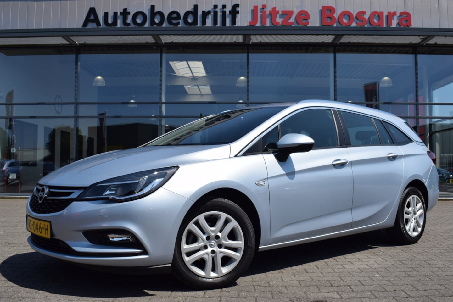 Opel Astra Sports Tourer - 1.4 Business+ Carplay | Full Map Navi | ECC | Sportstoelen | Volledig Onderhouden!! - AutoWereld.nl