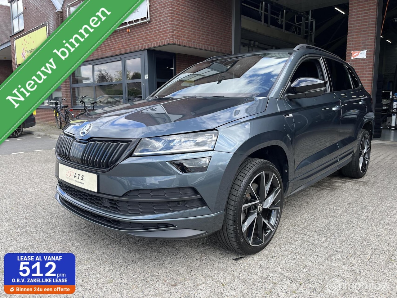 Skoda Karoq - 1.5 TSI ACT Sportline LED*ACC*TREKHAAK*CAMERA* - AutoWereld.nl