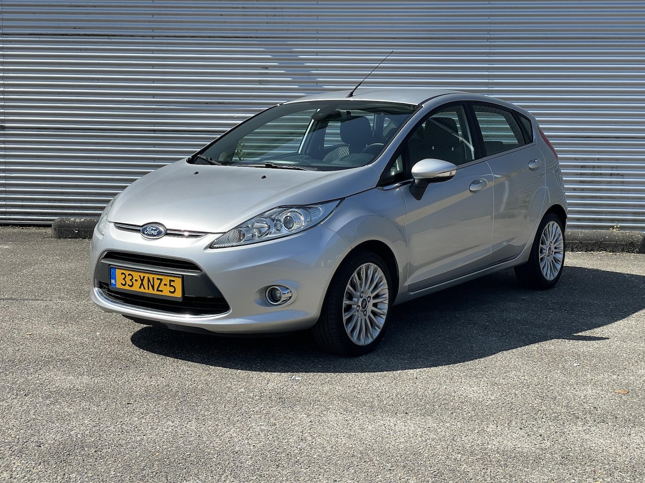 Ford Fiesta - 1.25 Titanium|Verwarmde voorruit - AutoWereld.nl