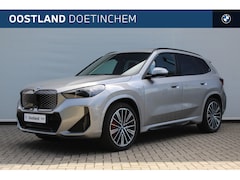 BMW iX1 - xDrive30 High Executive M Sport / Panoramadak / Trekhaak / Sportstoelen / M Adaptief onder