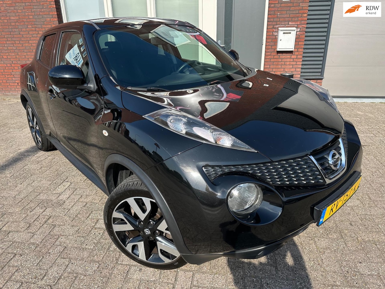 Nissan Juke - 1.6 Tekna / Navi / Camera / Clima / Cruise - AutoWereld.nl