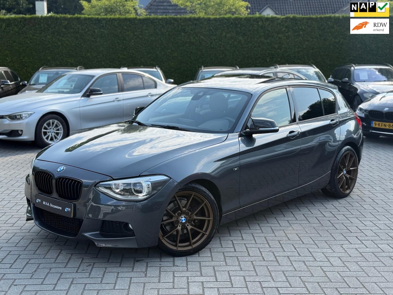 BMW 1-serie - 118i Business Sport|Nieuwe Ketting + Klepseals|Groot navigatie|Dakje|18 inch M|Cruise cont - AutoWereld.nl