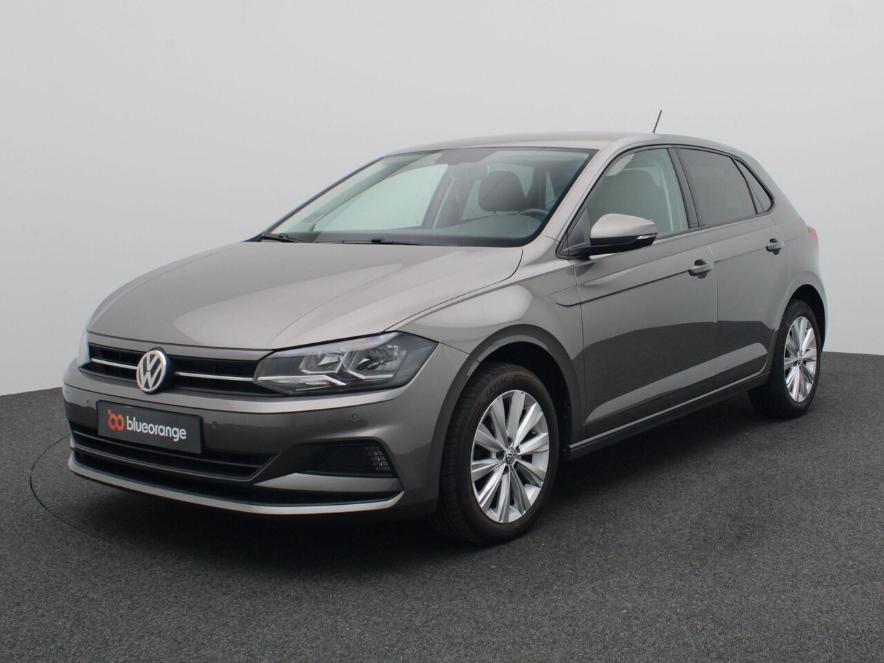 Volkswagen Polo - 1.0 TSI Comfortline Business 95PK Clima, Cruise Controle, Navi, Parkeersensoren voor en ac - AutoWereld.nl