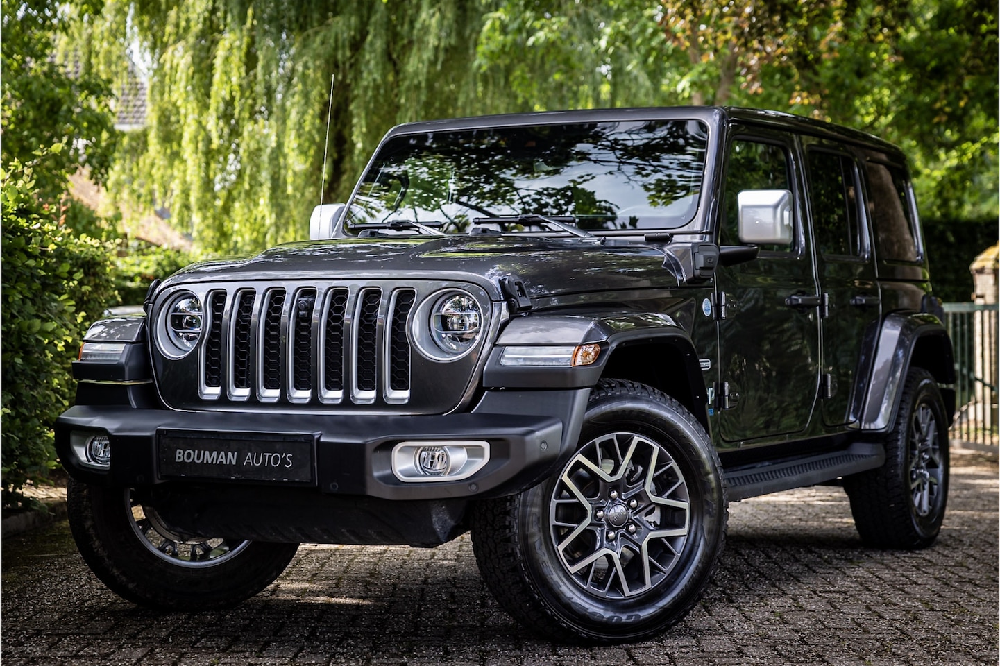Jeep Wrangler Unlimited - 4xe 380 Overland Softtop Sky One Trekhaak Adaptive Cruise - AutoWereld.nl