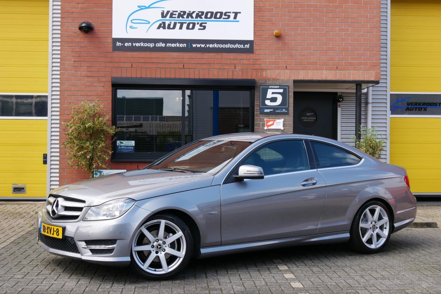 Mercedes-Benz C-klasse Coupé - 180 Premium Edition AMG. leder. stoelverwarming. zeer mooi - AutoWereld.nl
