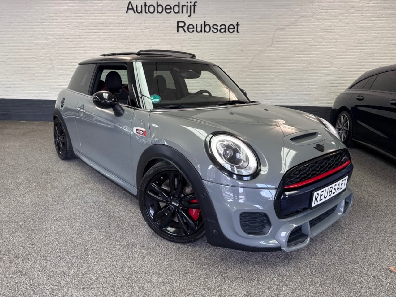 MINI Cooper - 2.0 JCW 230pk Panodak Kuipstoelen Clima Navi Cruise Incl 12Mnd Garantie - AutoWereld.nl