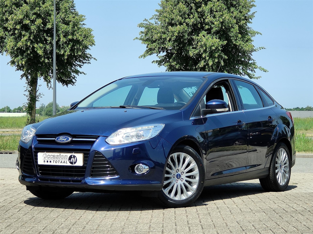 Ford Focus - 1.0 EcoBoost Titanium | Leder | Navi | Cruise | Climate - AutoWereld.nl